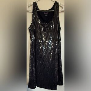 Questions by say what Black Sequin Dress